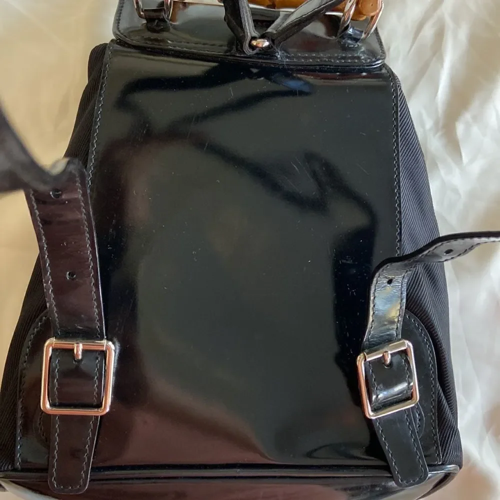 Gucci tassel oval mini backpack bambu Black impressive condition original dustba